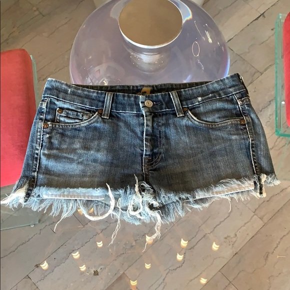 7 for all Mankind Jean Shorts sz 29, USA Made: Nice pair of Jean Shorts designed and manufactured in the United States of America by 7 for All Mankind. The shorts have a distressed look, the model is A Pocket, 9” total length. All items are sold