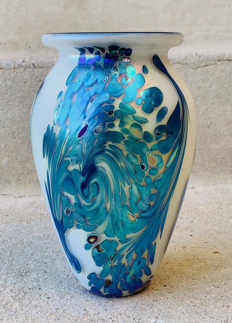 -Fireworks- Glass Vase by Robert Eickholt: Robert Eickholt is a well known glass artist who has been creating captivating blown glass for over 30 years. Robert founded Eickholt Glass in 1978 when he returned home to Columbus, Ohio after studyi