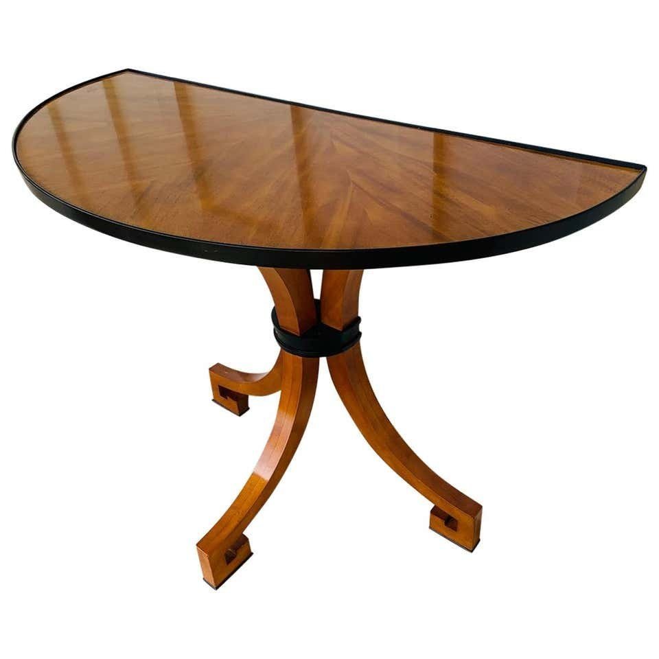 Stunning Wall Console W- Sunburst Top & Greek Key Legs: Stunning art deco style wall console feuturing a sunburst wooden top and greek key legs. The piece has a demilune shape, black wooden accents ad is in very good condition. Measurements: 45 inches wide