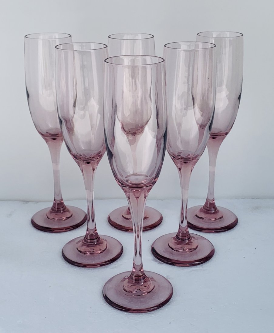 Set of 6 Vintage Champagne Flutes: Beautiful set of 6 vintage champagne Flutes/Glasses that are pinkish/or purple tint or tone to them, they are truly beautiful and hard to find all of the glasses are in excellent condition with no chi