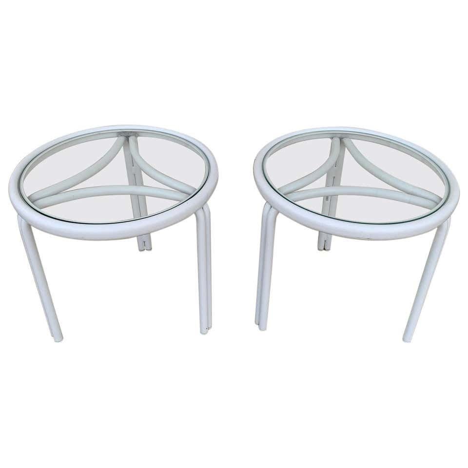 Pair of Tamiami Side Tables by Brown Jordan: Tamiami made its iconic debut in 1961 and immediately struck a chord with midcentury designers and the public alike. Featuring a streamlined aluminum frame, the Tamiami collection is an iconic midcent
