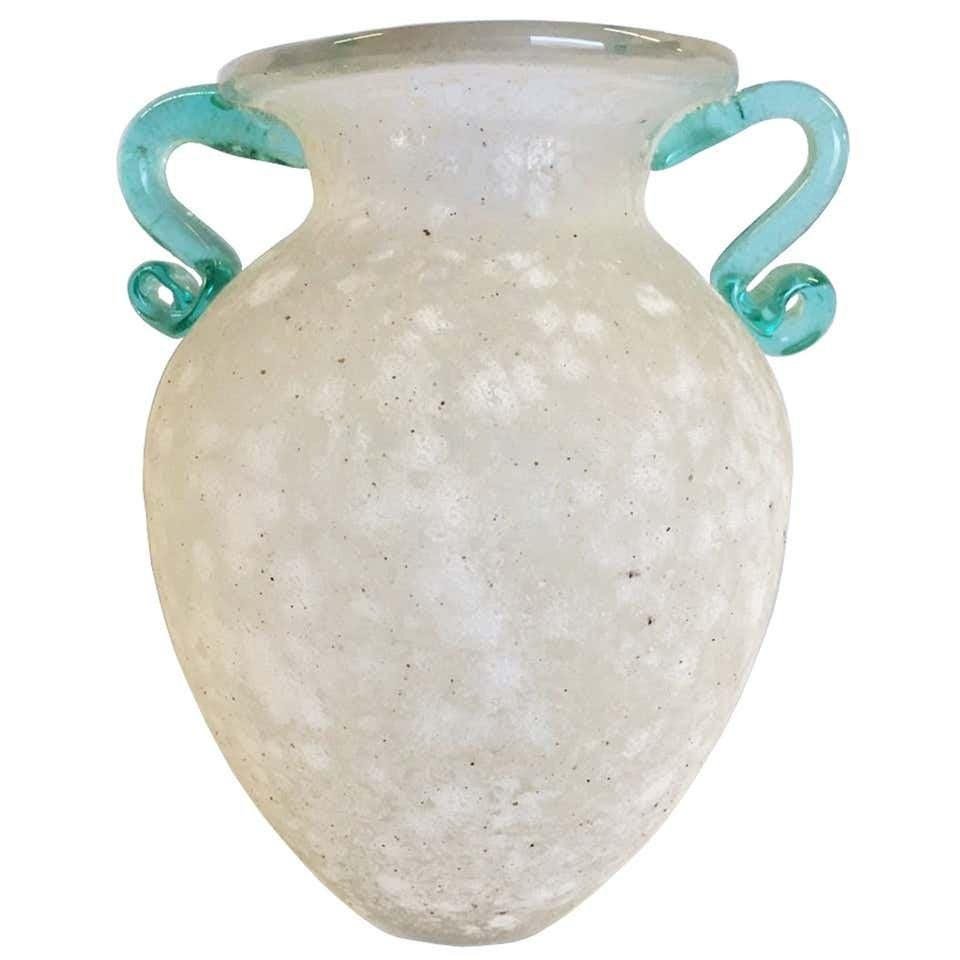 Italian Corrosi Glass Vase Signed: Beautiful Corrosi Murano glass vase from the 1960s.The vase is very delicate and whimsical. The piece is signed but I cannot make up the name. DIMENSIONS: 7 inches high x W 6 in. wide x D 6 in deep. A
