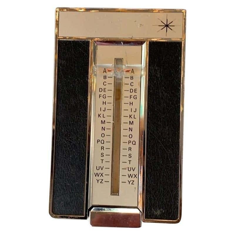 Vintage note/phone number keeper made in Japan: Telephone number keeper or just a note keeper notepad from the 19960ÃƒÂ‚Ã‚Â’s made in Japan, the brand is Lion. Metal with vinyl accents. Measurements: <6.5 deep x 4 wide x 1 high (inches) 