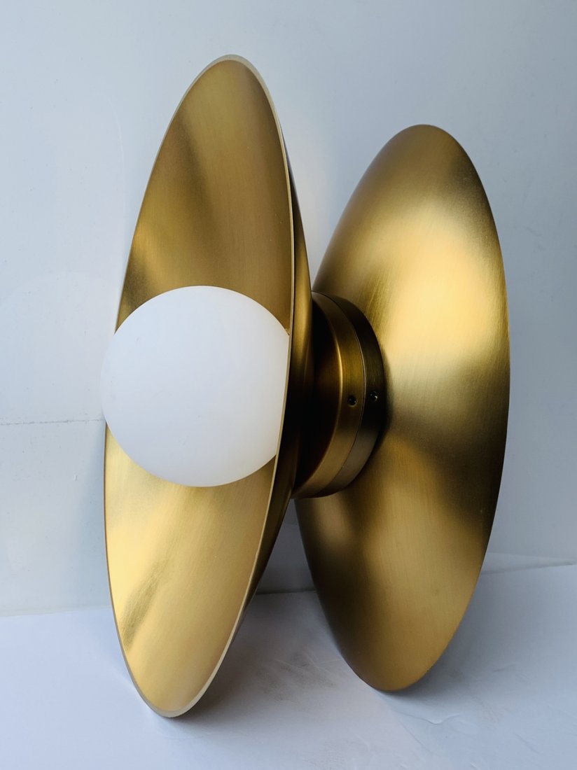 Pair of Joni Wall Sconces by Sean Lavin: The Joni Wall Sconce by Tech Lighting is a progressive interior lighting piece built to provide highly-efficient lighting while retaining a profile that’s both minimal and visually captivating. The 