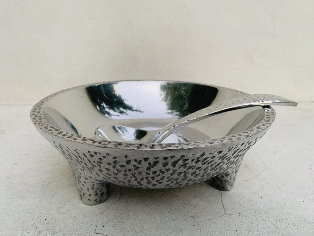 Pewter Molcajete & Ladle: The piece is in good condition. Measurements: 8.50 inches in diameter x 3 inches high Ladle is 7.50 inches long x 2.25 wide All items are sold as is. The auction house does not warrant authenticity on