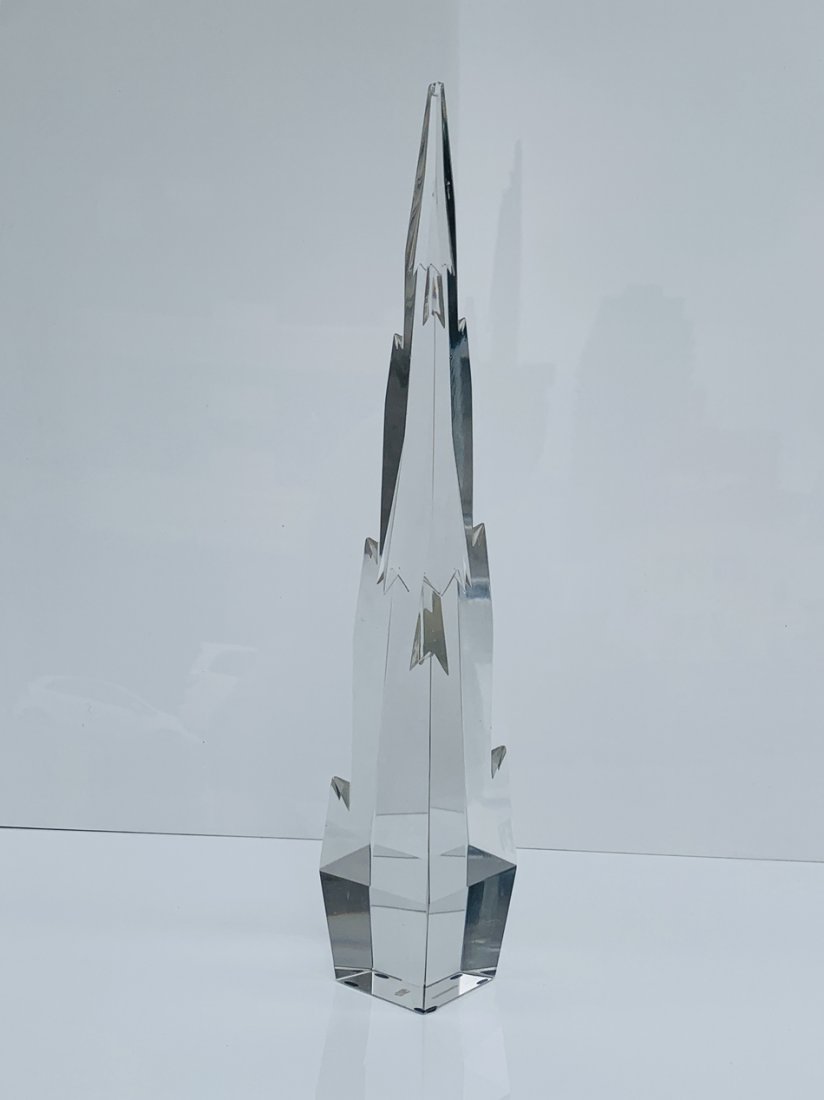 Stunning Crystal Obelisk: Stunning and beautiful crystal obelisk. Beautiful detail, very attractive and eye catching.Measurements:19 inches high x 3 inches square.All items are sold as is. The auction house does not warrant au