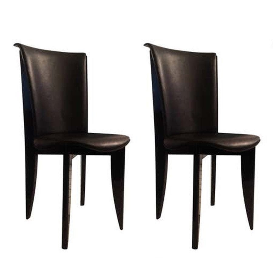 Pair of Italian Leather Chairs in Leather & Lacquer: Beautiful pair of chairs upholstered in high grain leather and black lacquered architectural frames. The chairs are in good condition, mild scratches and wear to frames and markings to leather.The cha