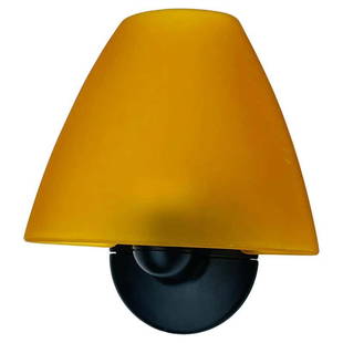 Sally Wall Sconce by Marcello Ziliani for Flos: Vintage wall sconce designed by Marcello Ziliani in the 1990s and manufactured by Flos.The Sally wall sconce has a glass shade and a metal bracket with a black finish.The piece retains the Flos label.