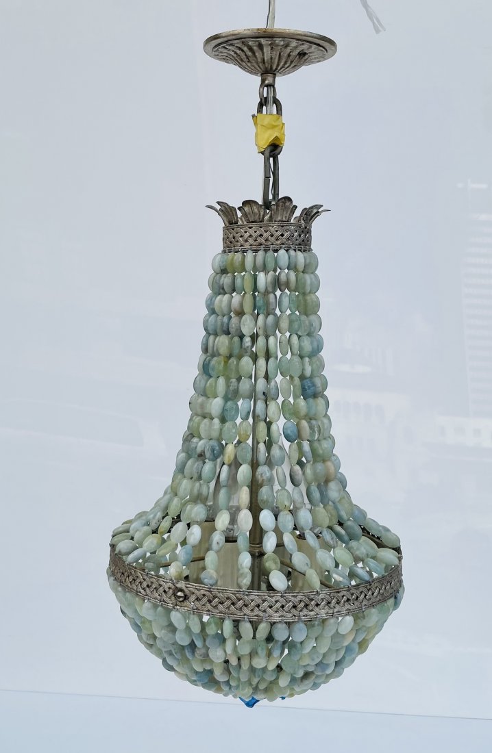 Beautiful Chandelier attb to Marjorie Skouras: Beautiful chandelier attributed to Marjorie Skouras. Measurements: 24 inches high x 10.25 inches in diameter. All items are sold as is. The auction house does not warrant authenticity on any specific 