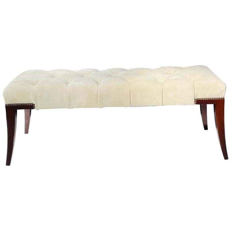 Adam Bench by Thomas Pheasant for Baker: Beautiful bench designed by Thomas Pheasant and manufactured by Baker furniture, made in the USA.The piece has beautiful lines, upholstered in an ivory color suede with nail head on the corners.The le