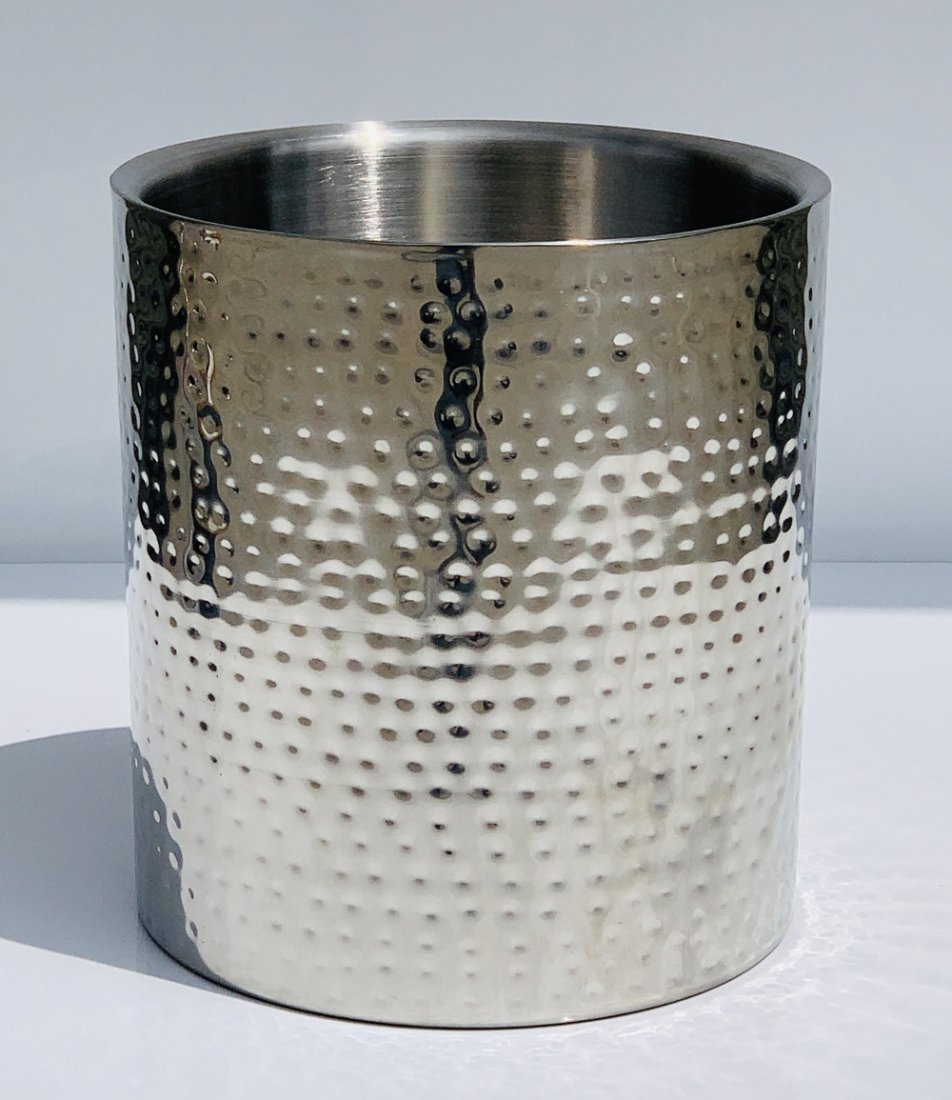 Stainless Steel Waste Basket by Vollrath: Beautiful waste basket in stainless steel marked Vollrath.The piece is in excellent condition, minimal wear. Measurements: 11.75 inches high x 11 inches in diameter All items are sold as is. The aucti