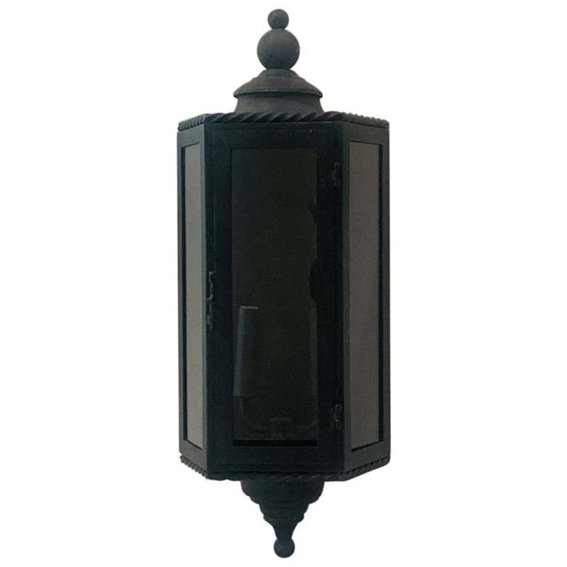 Large Forged Steel Light/Sconce with Verdigris Patina: The light is beautifully made, heavy and large in size, the piece was Hand made in Los Angeles and is 1 of 4 we have.The metal has a beautiful verdigriss patina , there are 2 light bulbs inside with a