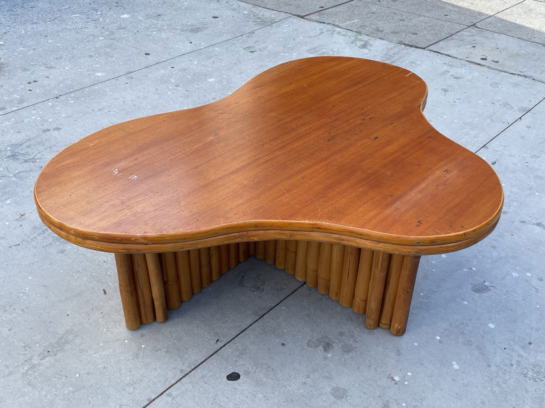 Free-form coffee table With a Rattan Base in the Style of Paul Frankl (1 of 13)