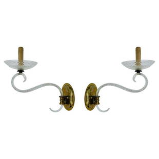 Pair of Murano Glass & Brass Wall Sconces: Stunning pair of Murano glass and brass wall sconces made in Italy in the 1960's.The pieces have beautiful shape, long leaf like arms with a large round cup holding the stem for the lightbulbs.The