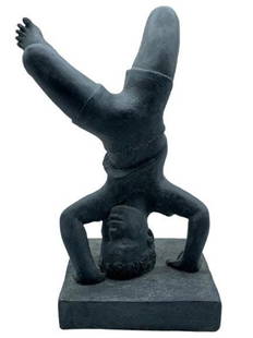 Vintage Sculpture of a boy doing a Handstand: Vintage composite sculpture of a boy doing headstands.Very playful and cute sculpture, perfect for indoor or outdoors.Measurements:12 inches wide x 12 inches deep x 23 inches high.All items are sold