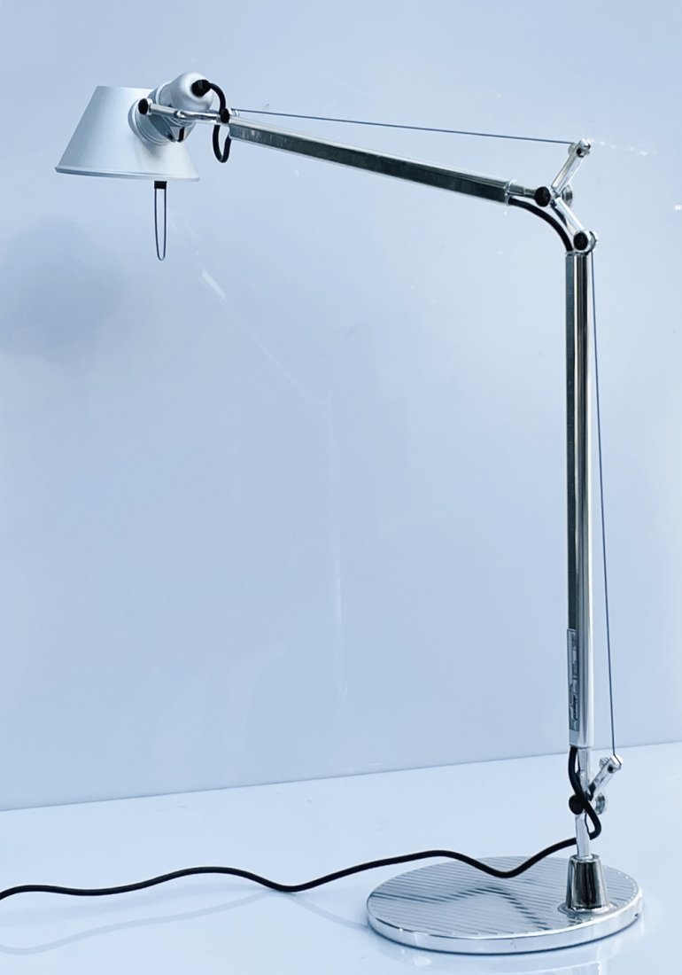 Tolomeo Table Lamp by Michele De Lucchi and Giancarlo Fassina: The Tolomeo table lamp is designed for a fully adjustable direction of light. Created for Artemide in 1987 by Michele De Lucchi and Giancarlo Fassina, Tolomeo has become an icon almost 30 years after