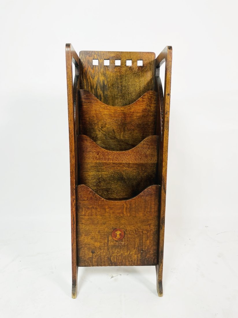 Arts & Crafts Style Tiered Magazine/Book Rack: A lovely Glasgow Arts & Crafts style magazine rack showcasing 3 section, all distanced apart to best display the front cover of the reading material within. The rack is at least 70 years old and with 