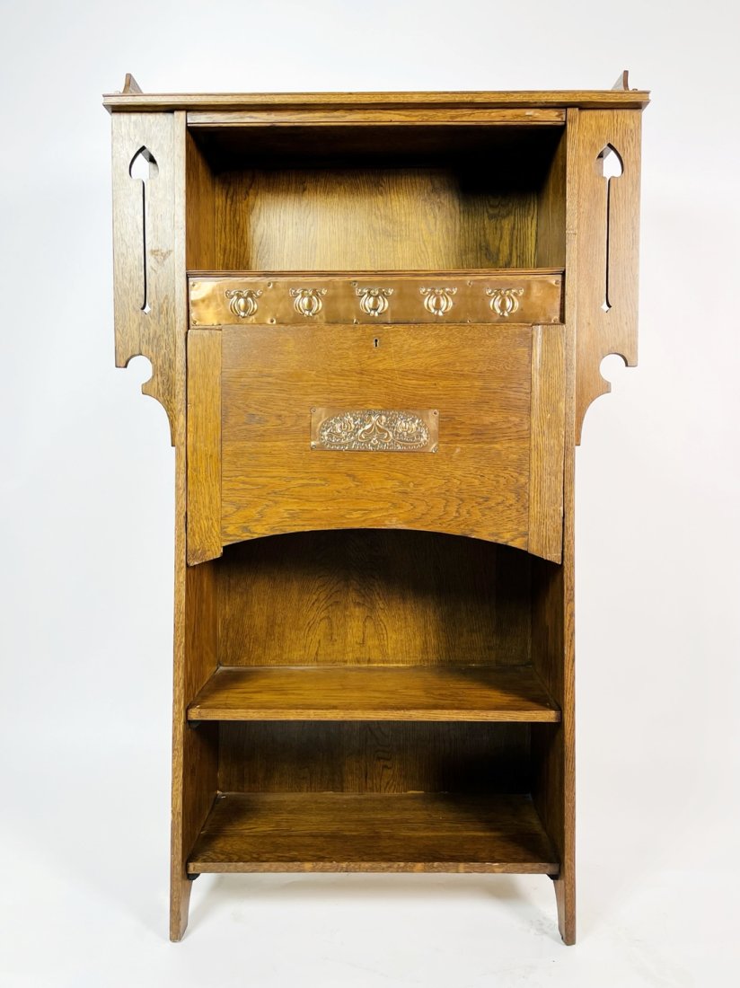 Arts & Crafts Secretary Desk with Hutch and Copper Inlay: Arts & Crafts Secretary Desk with hutch and copper inlay. The piece has a collapsible writing tray and cubbies for files and other office supplies as well as an upper shelf for books or decor. Measure
