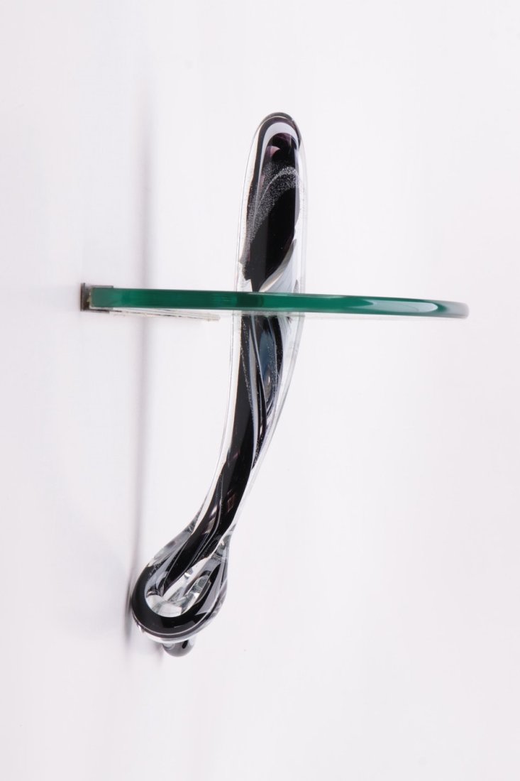 Glass Wall Shelf with a Handcrafted Art Glass Sculpture: Stunningly beautiful console wall table or shelf, consisting of a blown glass sculpture infused to a glass top. This is a true statement piece. Measurements: 20 inches wide x 18 inches high x 10.25 in