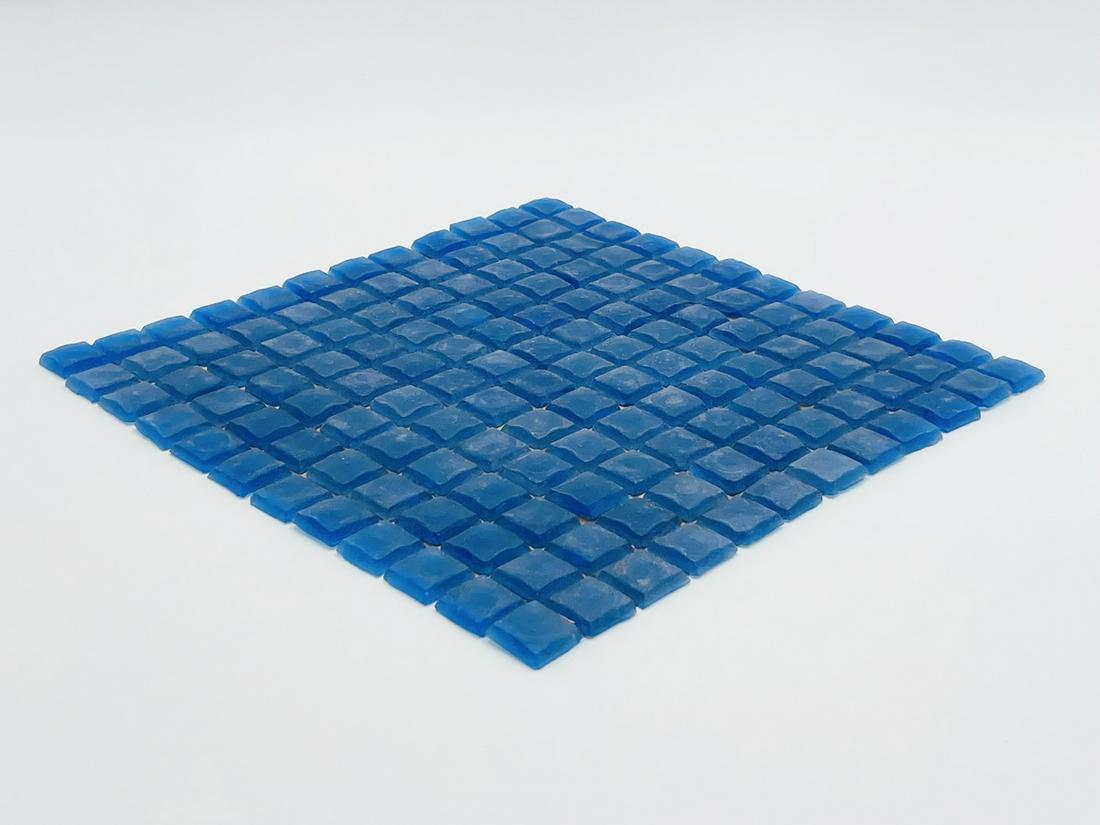5 boxes of Cobalt Blue Glass Mosaic Tile Backsplash 1x1: This lot is for 5 boxes, new nevr used glass tile. Each sheet is 12 inches square, each box has 20 sheets, each box covers 20 square feet. New in the box. All items are sold as is. The auction house d