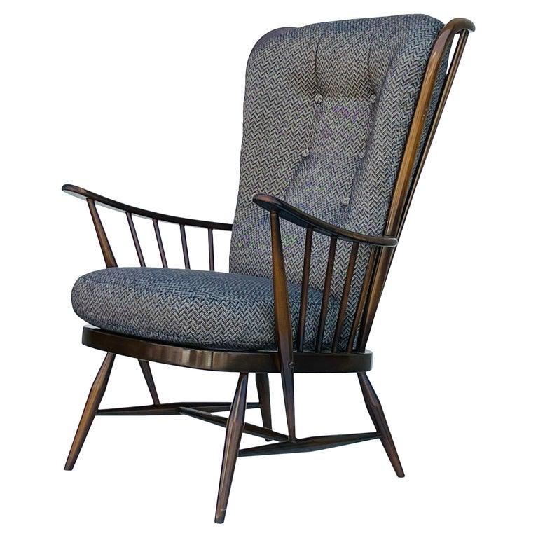 LOUNGE CHAIR BY LUCIAN RANDOLPH ERCOLANI FOR ERCOL: Beautiful lounge chair designed by Lucian Randolph Ercolani for Ercol. The chair has beautiful architectural lines, and is very comfortable. No Label. Measurements: 41 inches high x 29.25 inches wide