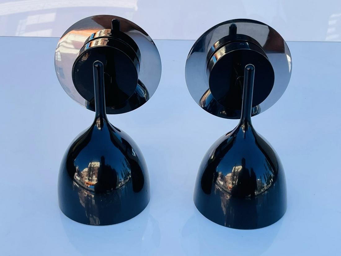 Pair of Wall Sconces in Black Lacquered Finish: Beautiful pair of wall sconces. black lacquered finish. All items are sold as is. The auction house does not warrant authenticity on any specific piece. THERE ARE NO RETURNS. We can only offer our opi