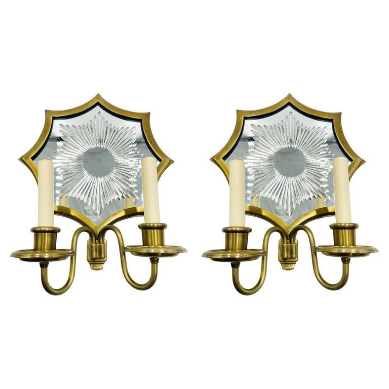 Pair of Solid Brass & Mirror Wall Sconces, E. F. Caldwell attb.: Beautiful pair of sconces attributed to E. F. Caldwell in solid brass with wonderful vintage starburst mirror is sure to make a wonderful addition to your decor. Measurements: 16 inches high x 12.50 i