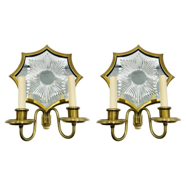 Pair of Solid Brass & Mirror Wall Sconces, E. F. Caldwell attb.: Beautiful pair of sconces attributed to E. F. Caldwell in solid brass with wonderful vintage starburst mirror is sure to make a wonderful addition to your decor. Measurements: 16 inches high x 12.50 i