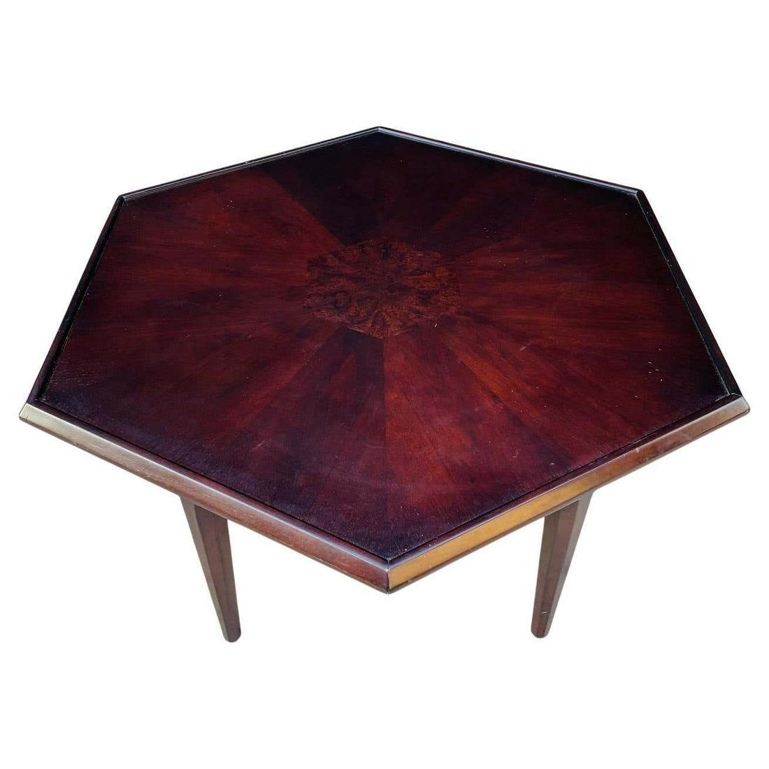 Coffee Table in the Style of Maurice Bailey: Hexagonal coffee table from the 1950s in the style of Maurice Bailey for Monteverdi-Young. The table has beautiful lines, finished in a dark walnut, the center has burlwood inlay. Good vintage conditi