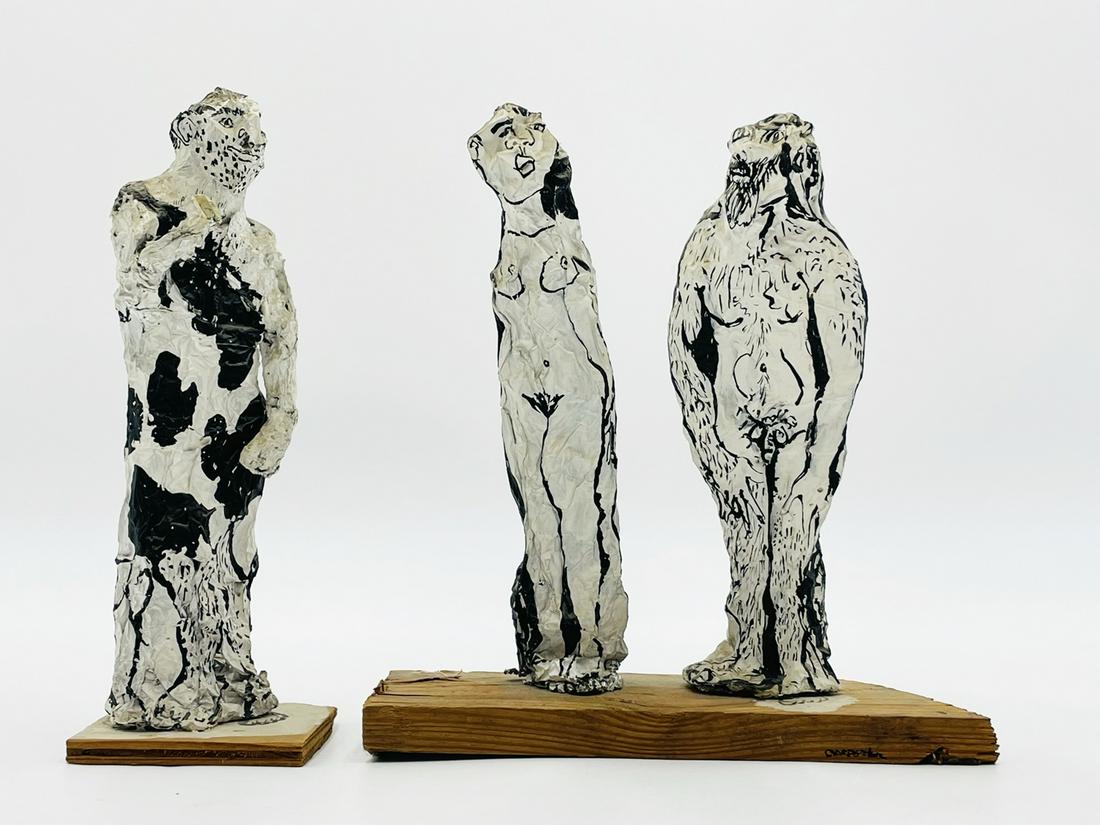 Folk Art Sculptures signed Carpenter: Set of 3 figurative folk art sculptures depicted a nude male and female together and a clothed male by himself. The pieces are made out of foil paper and the body lines are made with a sharpie. The pi