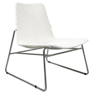 Modern Chair with Chromed Frame and Faux Wicker Seat: Beautiful chair with clean lines, chromed frame a faux wicker seat. The chair is very comfortable and it can be used indoors or outdoors. Measurements: 31 inches high x 22 inches wide x 29 inches d