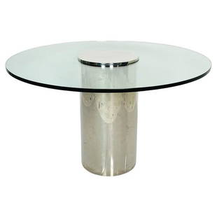 Chrome and Glass Pedestal Table in the Style of Curtis Jere/Pace Collection: Beautiful Pedestal dining table with a chromed pedestal base and a round glass top in the style of Curtis Jere or Pace Collection. Measurements: 48 inches in diameter x 28.75 inches high. The base is