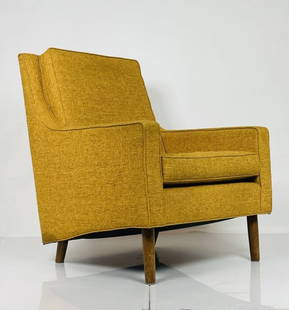 Mid-Century Modern Style Armchair made in the USA: Midcentury modern style arm chair designed and manufactured in the USA by Thrive Furniture in Los Angeles, upholstered in a Mustard yellow upholstery. Measurements: 41.25 inches high x 33.25 inches