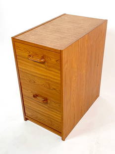 Danish Modern Teak Filing Cabinet: A mid century modern teak filing cabinet with two drawers for hanging files.  Made in Denmark.  Measurements:   27 inches high x 14.50 inches wide x 24 inches deep.  Provenance:  private col