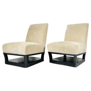 Pair of Slipper Chairs with Magazine/Shoe Shelf by John Hutton for Donghia: Beautiful pair of slipper chairs designed by John Hutton and manufactured in the USA by Donghia. The chairs have beautiful lines, the base has an integrated shelf that can be use as a magazine holder