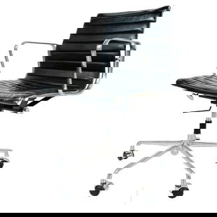 Aluminum Group Chair by Charles Eames for Herman Miller: Eames Aluminum group office chairs in black leather. The Eames management chair is part of the Eames Aluminum Group Collection. These distinctive chairs resulted from the Eames's experimentation with