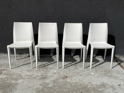 Set of Four Chairs by Mario Bellini for Heller: Set of 4 armless chairs designed in Italy by Mario Bellini and manufactured in the USA by Heller. This chair design earned celebrated Italian architect and designer Mario Bellini his eighth Compasso