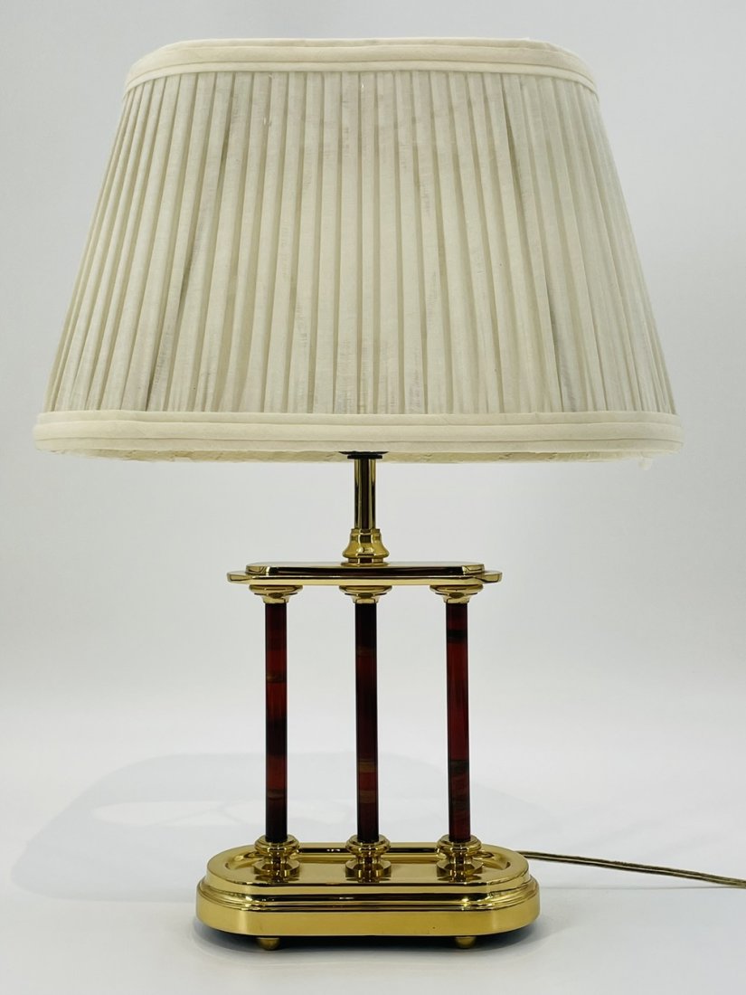 Vintage Brass Lamp Made in the USA by Frederick Cooper, 1970s: Vintage table lamp designed and manufactured in the USA by Frederick Cooper, Chicago Illinois. The lamp has a brass body with a cream colored shade. Measurements: 18.50 inches high x 13 inches wide x