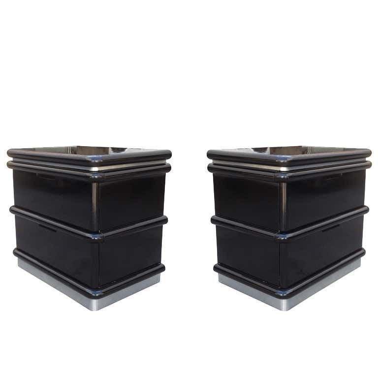 Jay Spectre Nightstands in Black Lacquer & Metal Plinth: Beautiful pair of nightstands designed by Jay Spectre in the late 1970s or early 1980s. The nightstands are in used condition, they have scratches, nicks and smudges and must be refinished, the plint