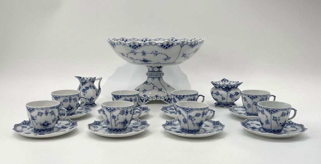 Fluted Full Lace Bowl on High Foot & 8 Cups & Saucers, Creamer & Sugar Bowl, By Royal Copenhagen: Royal Copenhagen Blue Fluted Full Lace Bowl on high Foot, 8 cups, 8 saucers, creamer and sugar bowl, designed by Arnold Krog in 1888 for Royal Copenhagen, all labeled. The high foot bowl is marked 1/1