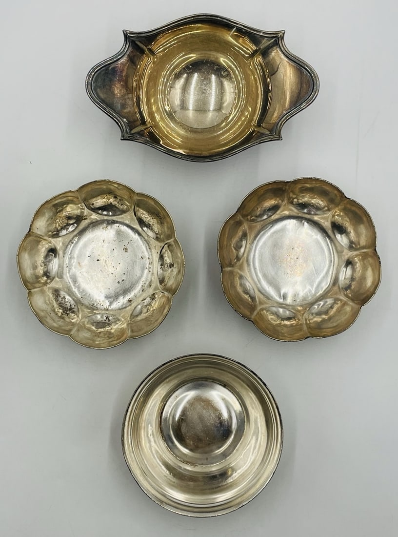 4 Silver Plated Bowls incuding 2 by Reed & Barton & One Shefield 283: Set of 4 silver plated bowls, 1 marked Reed & Barton 2800, hotel St Francis. 4.75 diameter x 1.75 high 1 marked H Bros S EPNS A1 5 diameter x 2 high 1 marked Hotel Victoria and other markings but 
