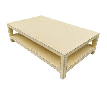 Coffee Table Embossed in Raffia, Karl Springer Style: Stunningly beautiful coffee table embossed in raffia and metal studs. The table has two levels but extra storage and is in excellent condition with minimal wear. Measurements: 60 inches wide x 36 in