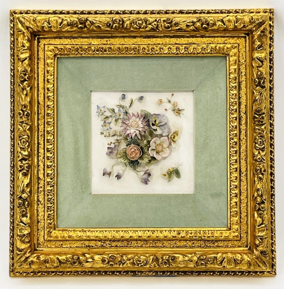 Framed Capodimonte Ceramic Flowers: Capodimonte Ceramic Flowers composition framed on a gold gilded frame. Measurements: 17 inches high x 17 inches deep x 2.75 inches deep/projection from the wall. All items are sold as is. The auction 