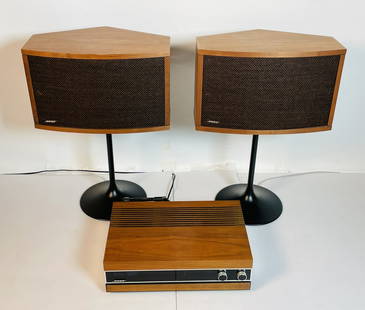 Pair of Bose 901 Speakers With Spatial Control Receiver: Pair of vintage set of Bose 901 speakers and spatial control terminal. The two speakers stand on black tulip bases reminiscent to the Eeero Saarinen design. The speakers and control terminal are encas