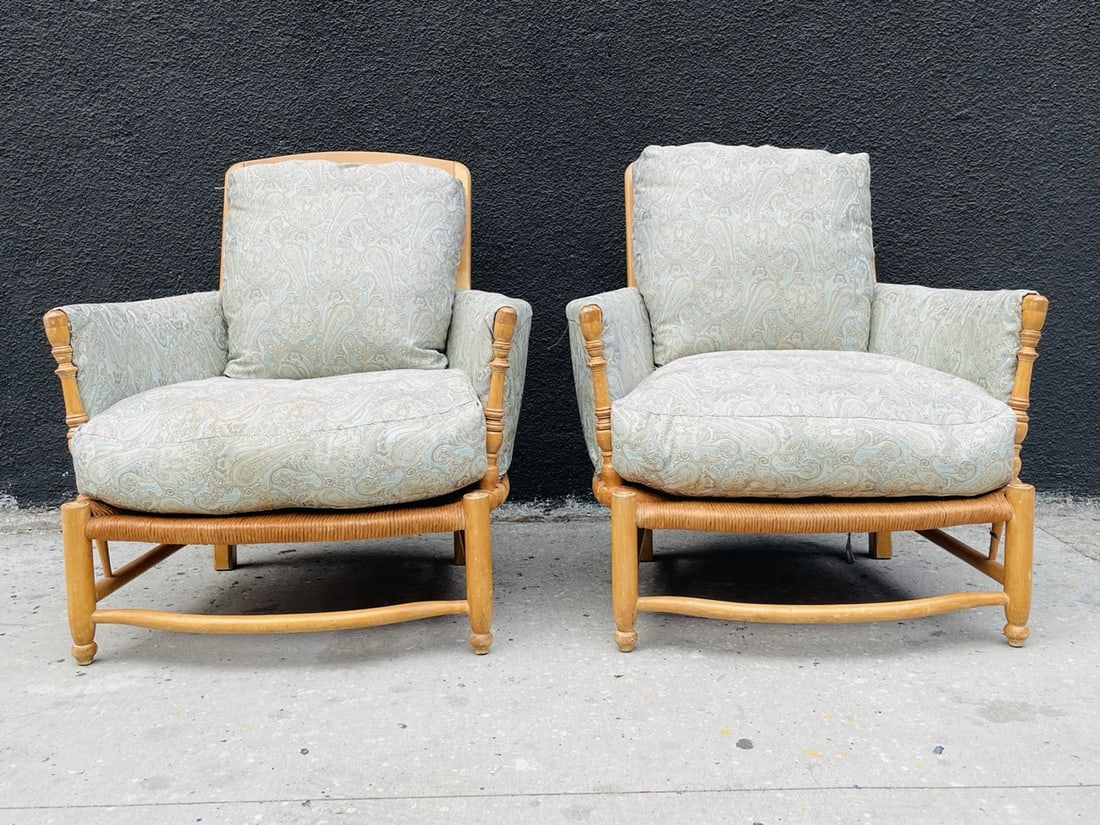 Pair of Country Rush Lounge Chairs by Charles Pollock Reproductions: Large pair of Lounge chairs made in Los Angeles by Charles Pollock Reproductions Inc. Measurements: 33.50 inches wide x 38 inches deep x 37.25 inches high x 17 seat height x 23.50 inches arm height.