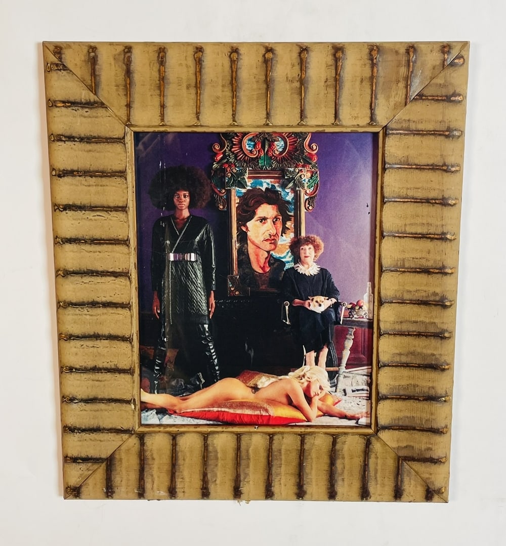 Wooden Picture Frame with a 2014 Barneys Photo by Bruce Weber: Vintage picture frame encasing a 2014 photo of the Barneys Campaing shot by Bruce Weber.Measurements: 15 inches high x 13 inches wide x .75 inches deep. All items are sold as is. The auction house doe