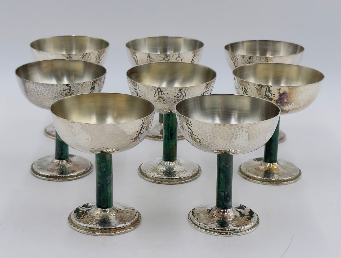 Set of 8 Hammered Silver & Inlaid Malachite Water/Wine Glasses by Los Castillo, Mexico 20th Century: Set of eight hammered silver and inlaid malachite stone water/wine glasses designed and manufactured by Los Castillo silversmiths in Taxco, Mexico in the mid to late 20th century. The pieces have mala