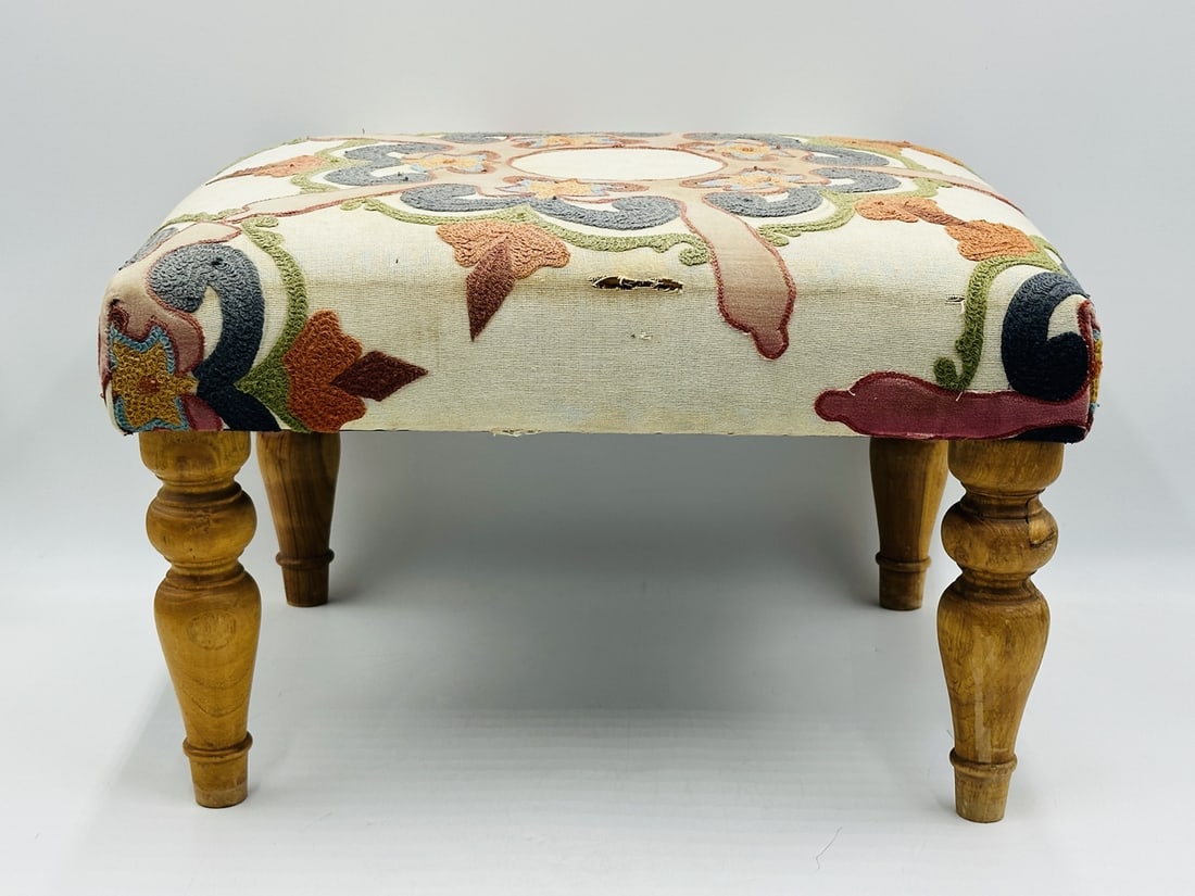 Vintage Stool/Ottoman With Bright Upholstery: Vintage stool/ottoman with a very cool upholstery. Unmarked. Measurements: 20 inches wide x 16 inches deep x 12.50 inches high. All items are sold as is. The auction house does not warrant authenticit