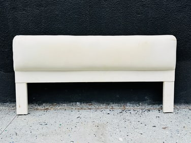 Modern king size headboard upholstered in white linen fabric.