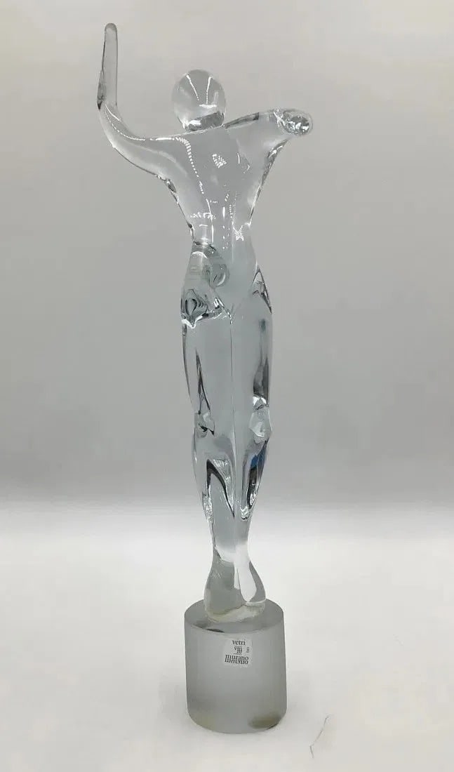 Murano Glass Sculpture of a Nude Male Dancer by Renato Anatra: Vintage Murano glass sculpture made in Italy and signed Renato Anatra and with labeled Murano Vetri. The sculpture depicts a nude male dancer standing tall with his hands on a dance pose. Hand signed